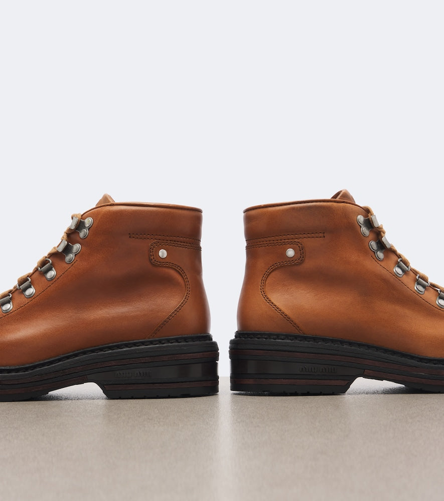Miu Miu Leather lace-up boots in Brown - Flat Boots