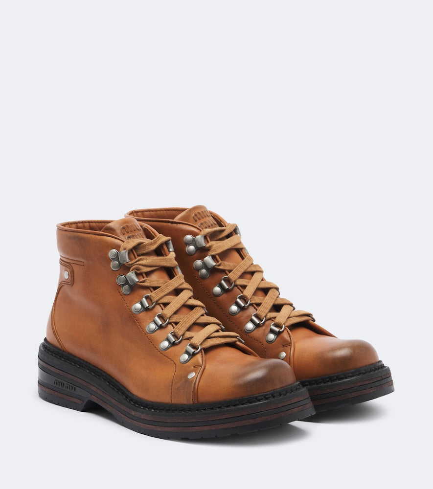 Miu Miu Leather lace-up boots in Brown - Flat Boots