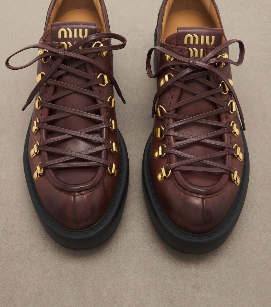 Miu Miu Leather lace-up loafers in Brown - Mid Heel Boots