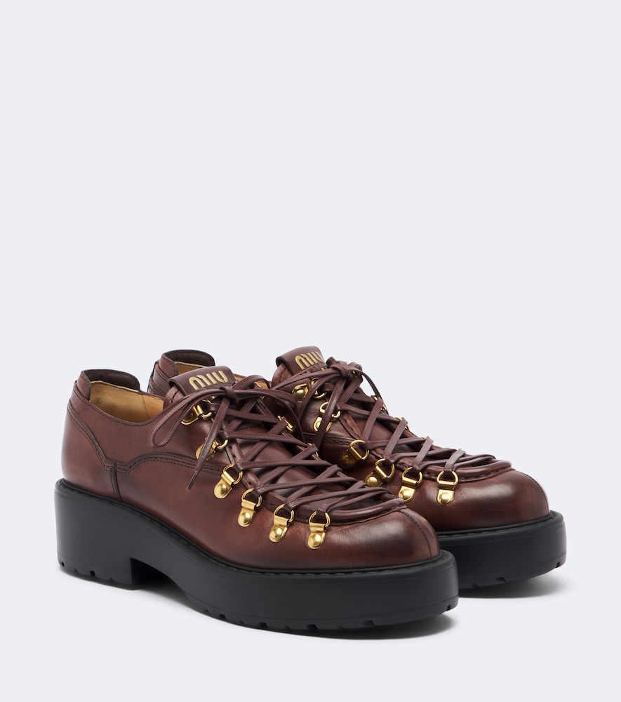 Miu Miu Leather lace-up loafers in Brown - Mid Heel Boots