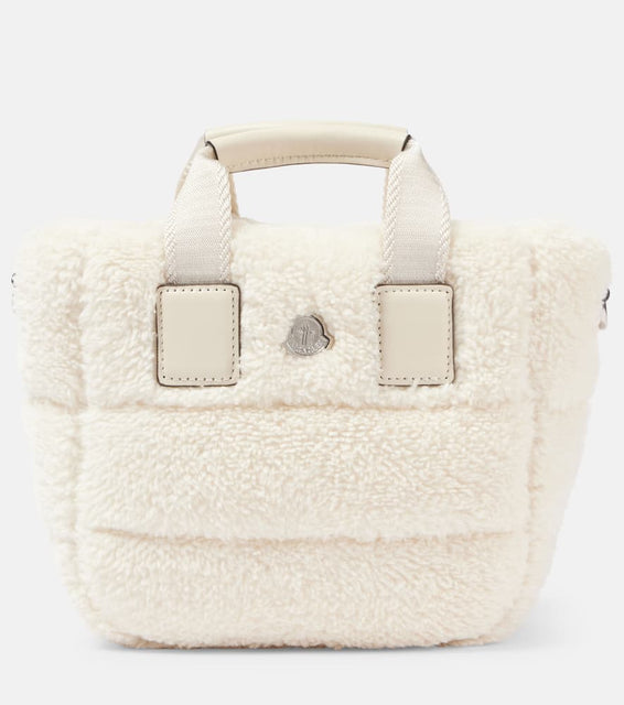 Moncler Caradoc Micro tote bag. Shop Moncler Top-Handle Bags for women now.