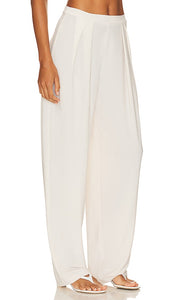 Norma Kamali Tapered Pleated Trouser in Cream