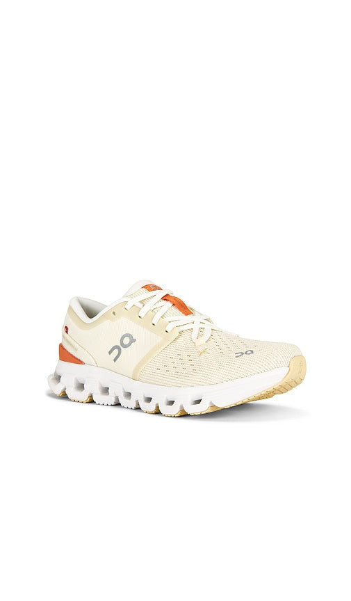 On Cloud X 4 Sneaker in Cream
