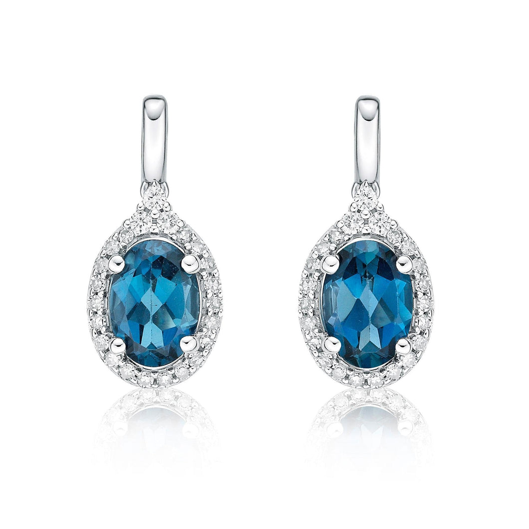 Oval London Blue Topaz and 1/4ctw Diamond White Gold Earrings