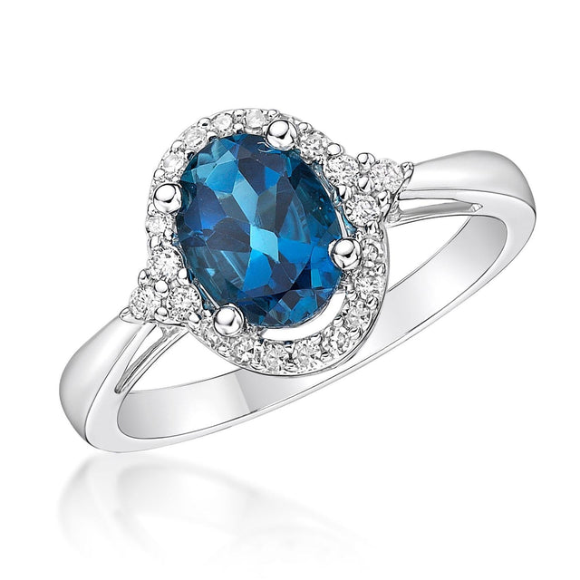 Oval London Blue Topaz and 1/5ctw Diamond White Gold Ring - Size 7
