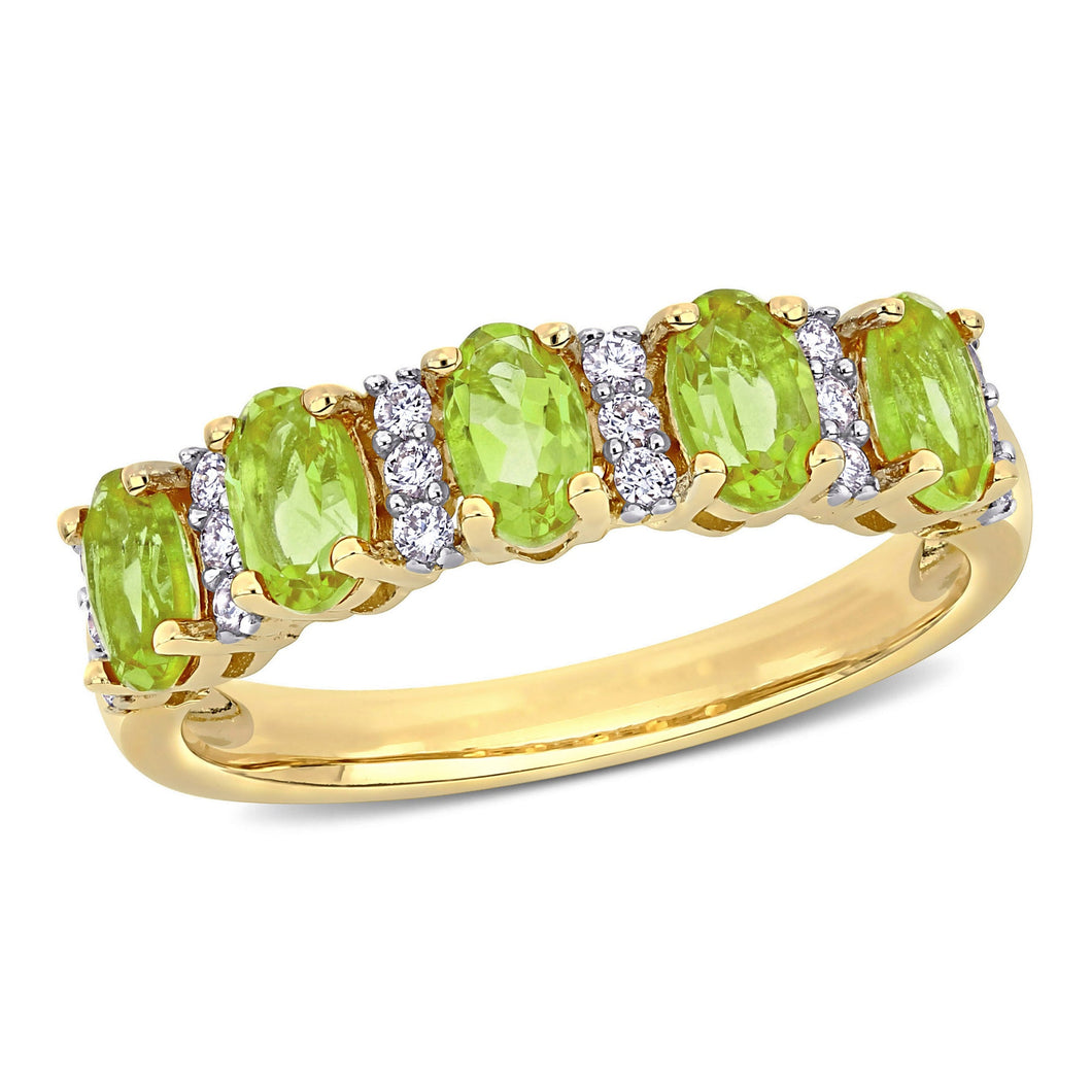 Oval Peridot and 1/6ctw Diamond Yellow Gold Ring | Size 4