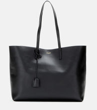 Saint Laurent Shopping E/W leather tote bag. Shop Saint Laurent Tote Bags for women now.
