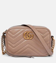 Gucci GG Marmont Mini crossbody bag. Shop Gucci Shoulder Bags for women now.