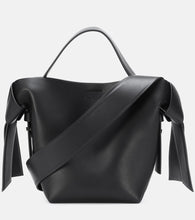 Acne Studios Musubi Mini leather shoulder bag. Shop Acne Studios Top-Handle Bags for women now.