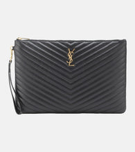 Saint Laurent Cassandre matelass√É¬© leather clutch. Shop Saint Laurent Clutches for women now.