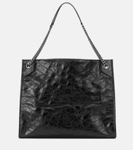 Saint Laurent Niki Large leather tote. Shop Saint Laurent Tote Bags for women now.