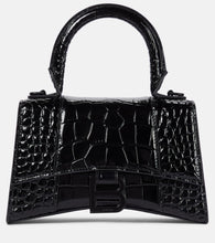 Balenciaga Hourglass XS leather crossbody bag. Shop Balenciaga Top-Handle Bags for women now.