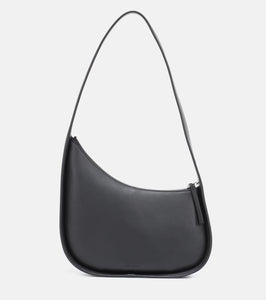The Row Half Moon leather shoulder bag. Shop The Row Shoulder Bags for women now.