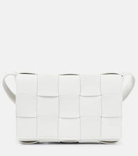 Bottega Veneta Cassette leather shoulder bag. Shop Bottega Veneta Shoulder Bags for women now.