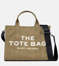 Marc Jacobs The Medium canvas tote bag. Shop Marc Jacobs Tote Bags for women now.