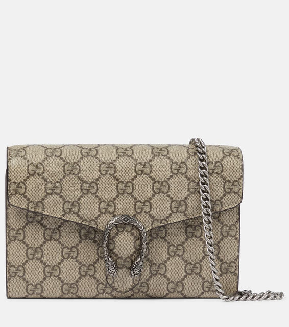 Gucci Dionysus GG Supreme clutch. Shop Gucci Clutches for women now.