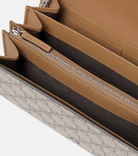 Gucci Dionysus GG Supreme clutch
