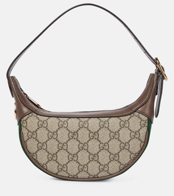 Gucci Ophidia GG Mini shoulder bag. Shop Gucci Shoulder Bags for women now.