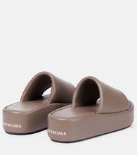 Balenciaga Rise leather platform slides