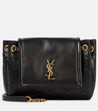 Saint Laurent Nolita Mini leather shoulder bag. Shop Saint Laurent Shoulder Bags for women now.