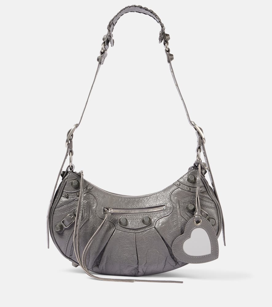 Balenciaga Le Cagole Small leather shoulder bag. Shop Balenciaga Shoulder Bags for women now.