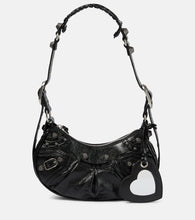 Balenciaga Le Cagole XS leather shoulder bag. Shop Balenciaga Shoulder Bags for women now.