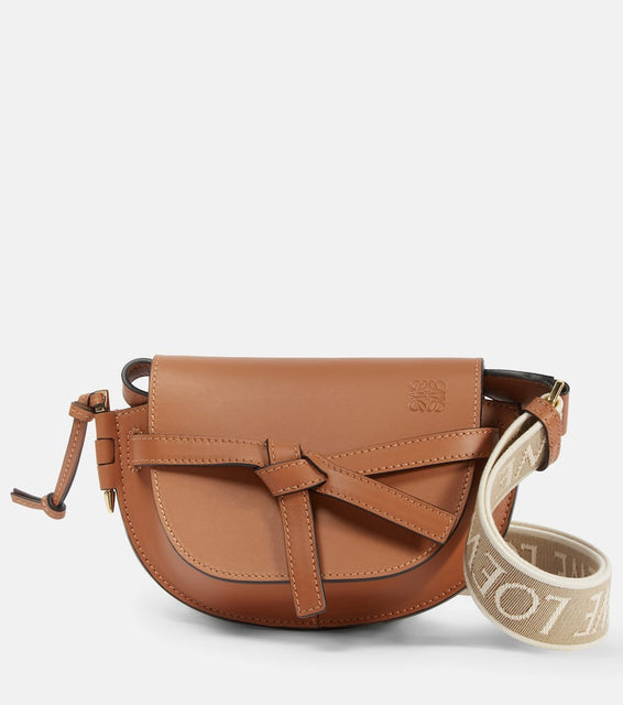 Loewe Gate Dual Mini leather and jacquard shoulder bag. Shop Loewe Shoulder Bags for women now.