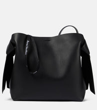 Acne Studios Musubi Medium leather shoulder bag. Shop Acne Studios Tote Bags for women now.