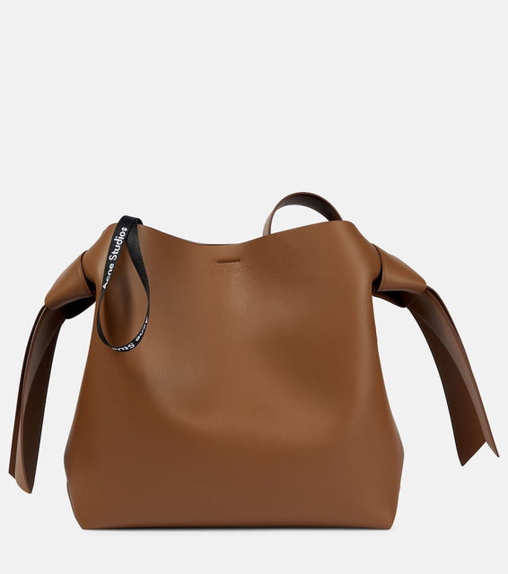 Acne Studios Musubi Medium leather shoulder bag. Shop Acne Studios Shoulder Bags for women now.
