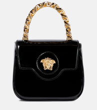 Versace La Medusa mini leather tote. Shop Versace Top-Handle Bags for women now.