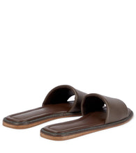 Brunello Cucinelli Embellished leather slides