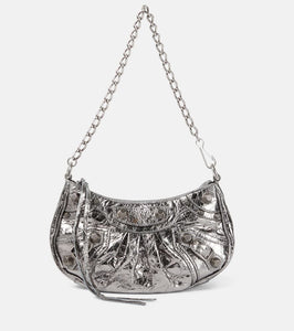 Balenciaga Le Cagole Mini leather shoulder bag. Shop Balenciaga Shoulder Bags for women now.