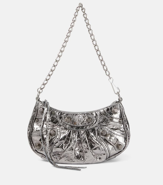 Balenciaga Le Cagole Mini leather shoulder bag. Shop Balenciaga Shoulder Bags for women now.