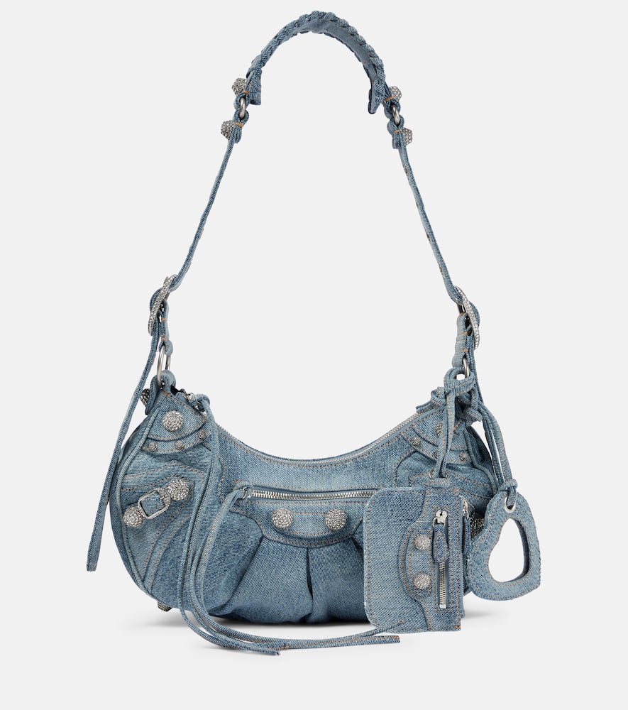 Balenciaga Le Cagole Small denim shoulder bag. Shop Balenciaga Shoulder Bags for women now.