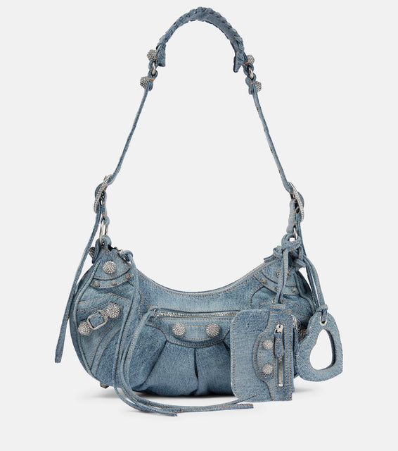 Balenciaga Le Cagole Small denim shoulder bag. Shop Balenciaga Shoulder Bags for women now.