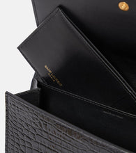 Saint Laurent Uptown croc-effect leather wallet on chain