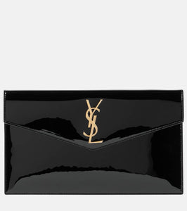 Saint Laurent Uptown patent leather clutch. Shop Saint Laurent Clutches for women now.