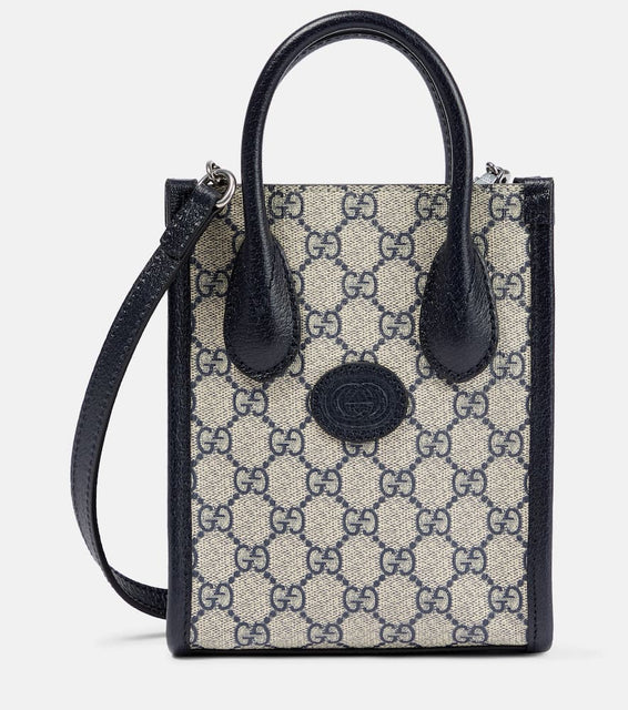 Gucci GG Supreme Mini canvas tote. Shop Gucci Top-Handle Bags for women now.