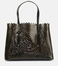 Alaia Le Mina 32 New Vienne leather tote bag. Shop Alaia Top-Handle Bags for women now.