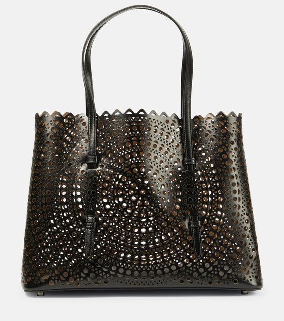 Alaia Le Mina 32 New Vienne leather tote bag. Shop Alaia Top-Handle Bags for women now.