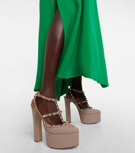 Valentino Garavani Rockstud patent leather platform pumps