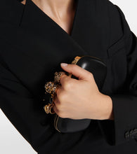 Alexander McQueen Knuckle leather clutch