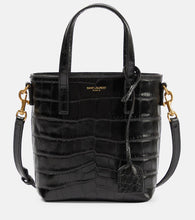 Saint Laurent Toy Shopping N/S leather tote bag. Shop Saint Laurent Top-Handle Bags for women now.