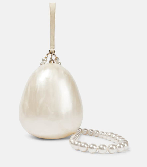 Simone Rocha Egg leather-trimmed clutch. Shop Simone Rocha Clutches for women now.