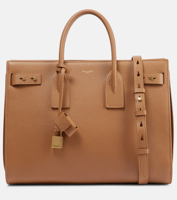 Saint Laurent Sac De Jour Supple Medium leather tote bag. Shop Saint Laurent Tote Bags for women now.