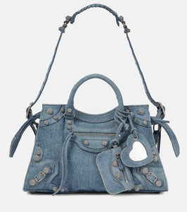 Balenciaga Neo Cagole City shoulder bag. Shop Balenciaga Shoulder Bags for women now.
