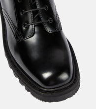 The Row Ranger patent leather ankle boots