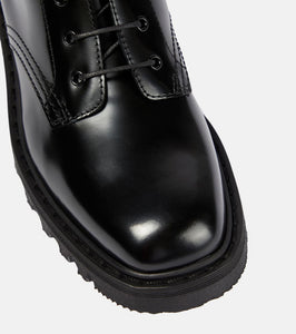 The Row Ranger patent leather ankle boots