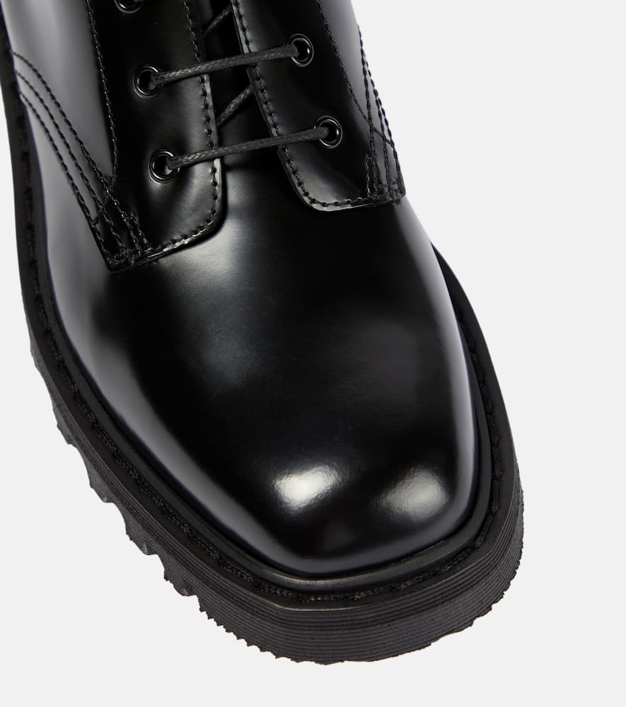 The Row Ranger patent leather ankle boots