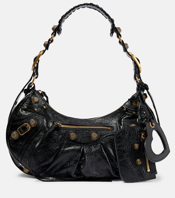 Balenciaga Le Cagole Small leather shoulder bag. Shop Balenciaga Shoulder Bags for women now.
